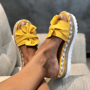 Zapatillas anudadas con sandalias gruesas de suela